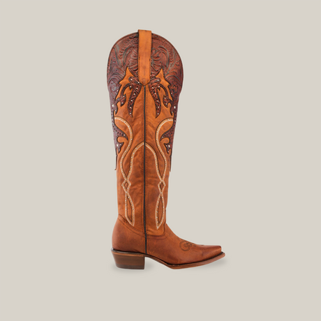 The Miriam Brick - Tall Shaft - Snip Toe is a womens tall, brown leather cowboy boot crafted from premium materials with intricate decorative stitching and a detailed embossed pattern at the top. It features a low heel and slightly pointed toe, displayed on a plain white background.