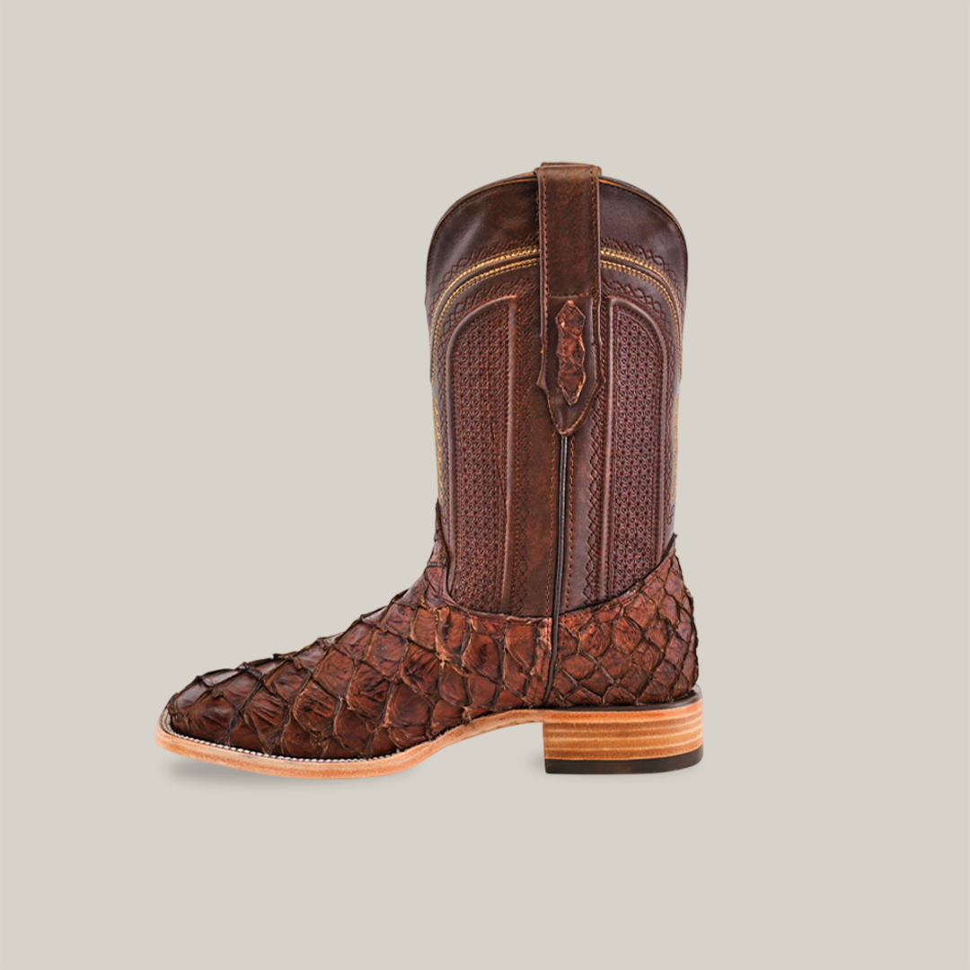 The Exotic Piraruco Fish boot in matte brown features detailed stitching and a square toe, set against a plain white background.