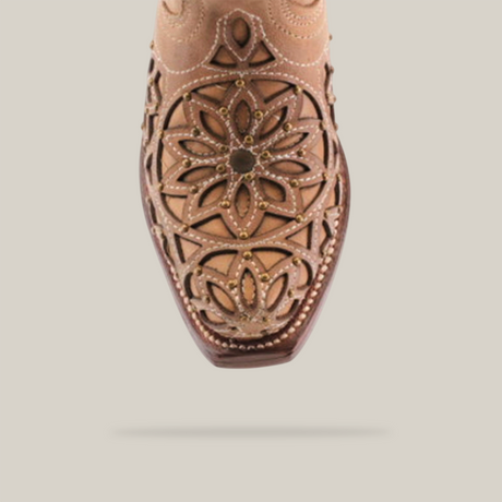 The Vitralli Studs Fawn Snip Toe boots floral cutout design and decorative stitching in premium leather are highlighted from a top view, revealing its intricate craftsmanship against the white backdrop.