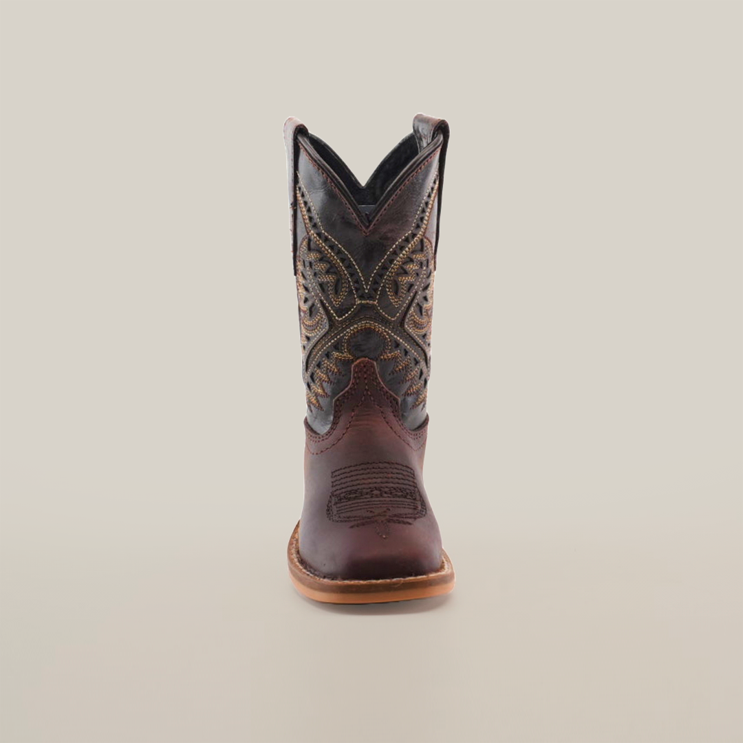 Front view of the Salvage Almond Square Toe, a single brown cowboy boot made from premium cowhide leather, showcasing intricate stitching and a pointed toe, set against a plain white background.