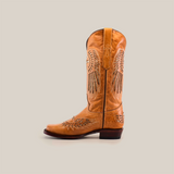 The Texas Cross Glitterbomb Orix boot features intricate wing-like stitching on premium leather, a narrow square toe, top pull tab, and a low block heel, all set against a plain white background for an elegant side view.