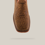 Close-up of the Elephant Print Orix - Square Toe cowboy boot showcasing a brown, textured crisscross pattern in premium leather with detailed edge stitching on a white background.