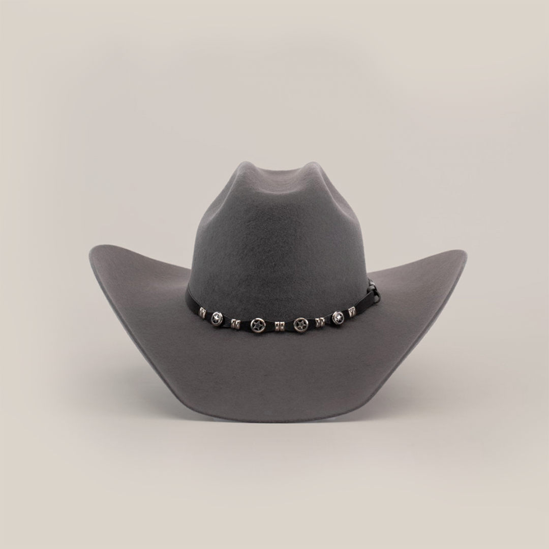 The 6X Bull Oxford is a gray felt cowboy hat with a wide brim, adorned with a decorative black band and circular silver embellishments around the crown, exemplifying luxury western wear against a plain white background.